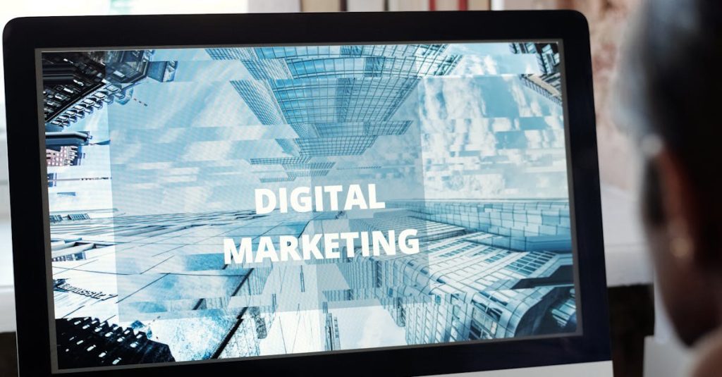 An individual focused on digital marketing on a desktop computer in a cozy workspace.